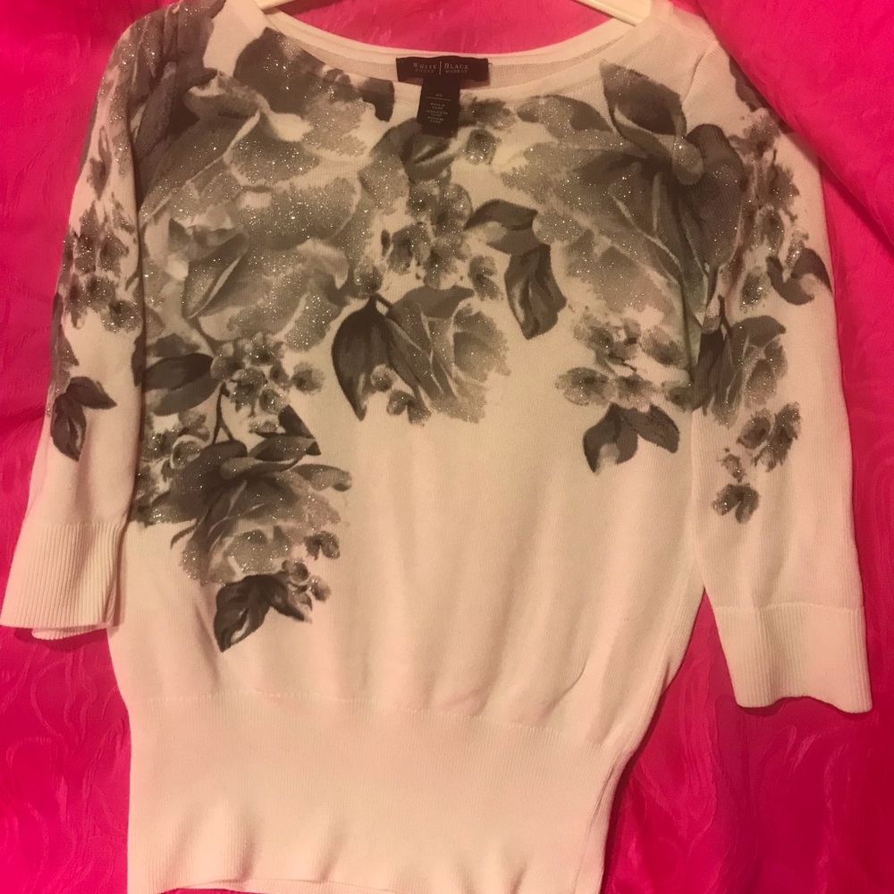 Light top with black and gray floral print